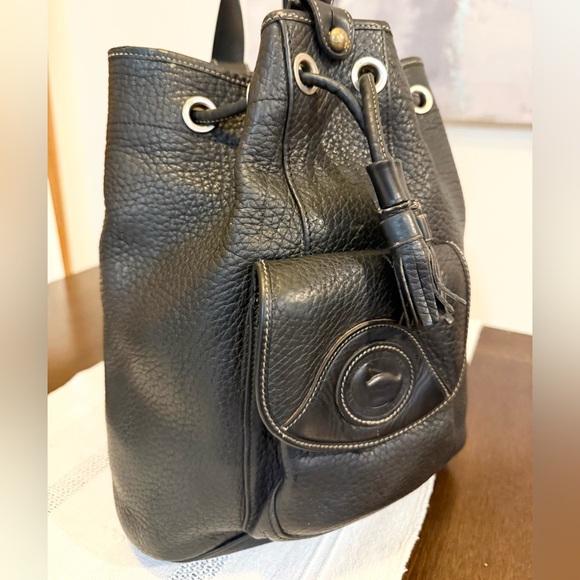 $50- Vintage Dooney & Bourke Made in USA
Drawstring One Sling Backpack - Picture 3 of 13